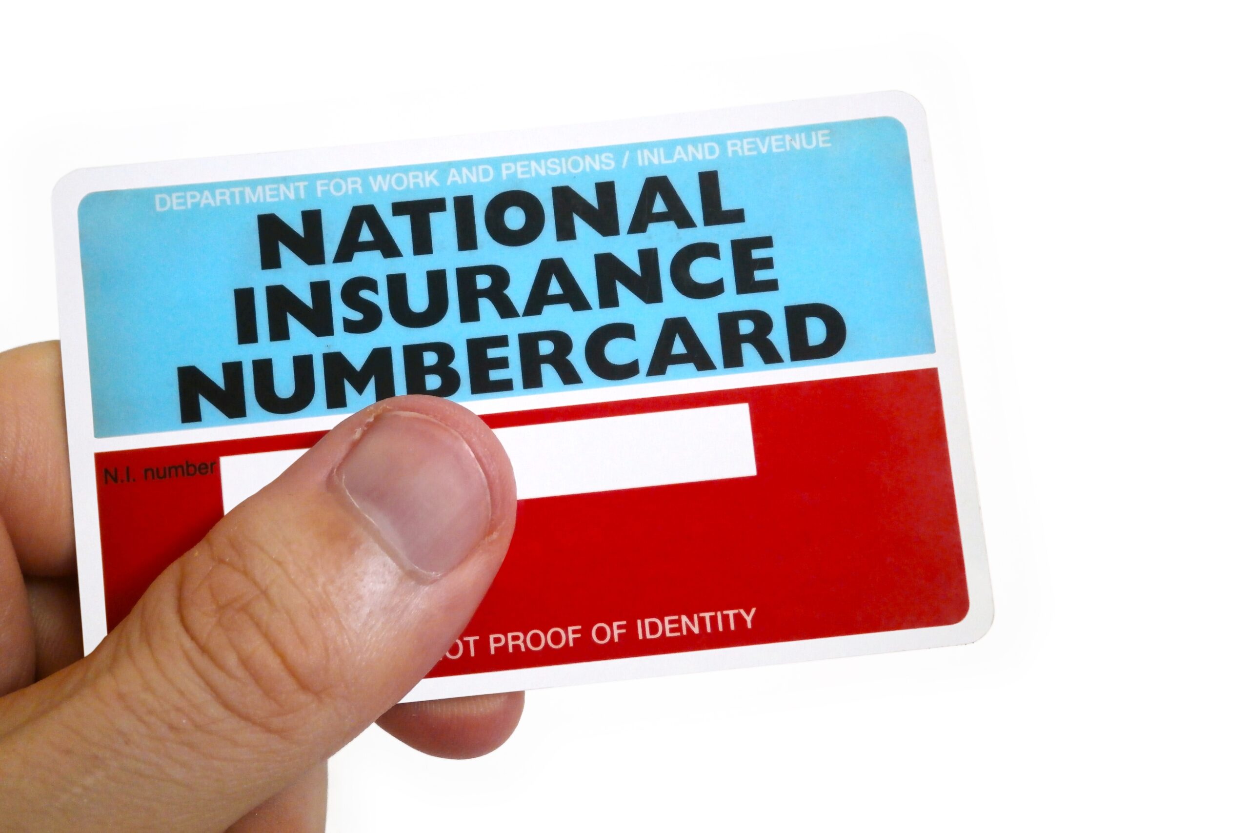 fingers of a man holding a national insurance number